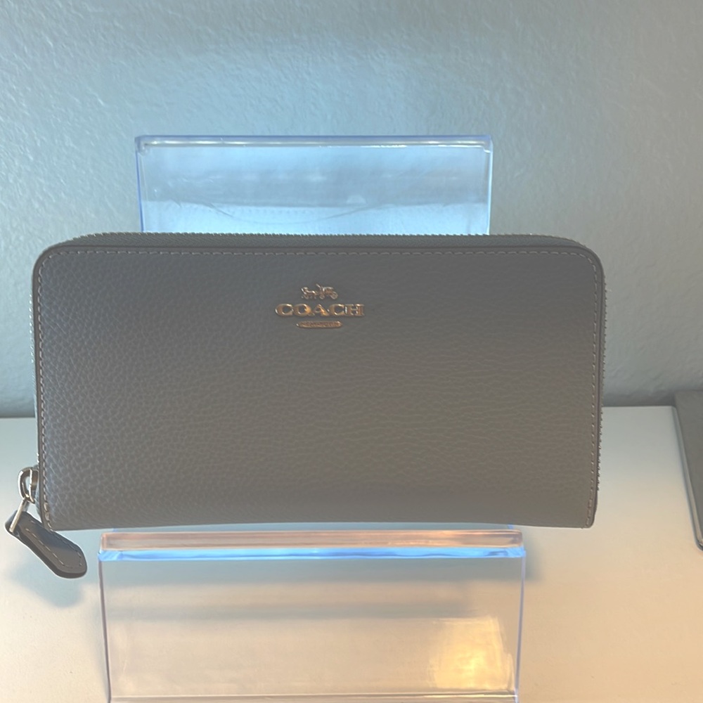 Baby blue Coach wallet with silver hardware
